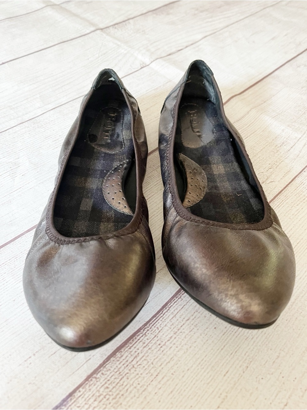 Born metallic bronze ballet flats